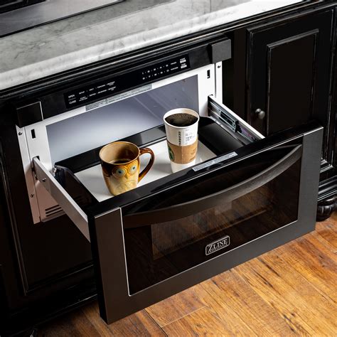 black stainless steel microwave white cabinets|kitchen cabinets with microwave drawer.